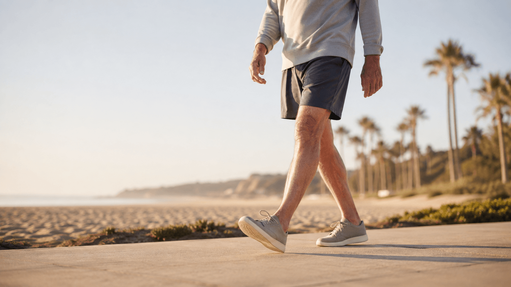 People walking along the beach