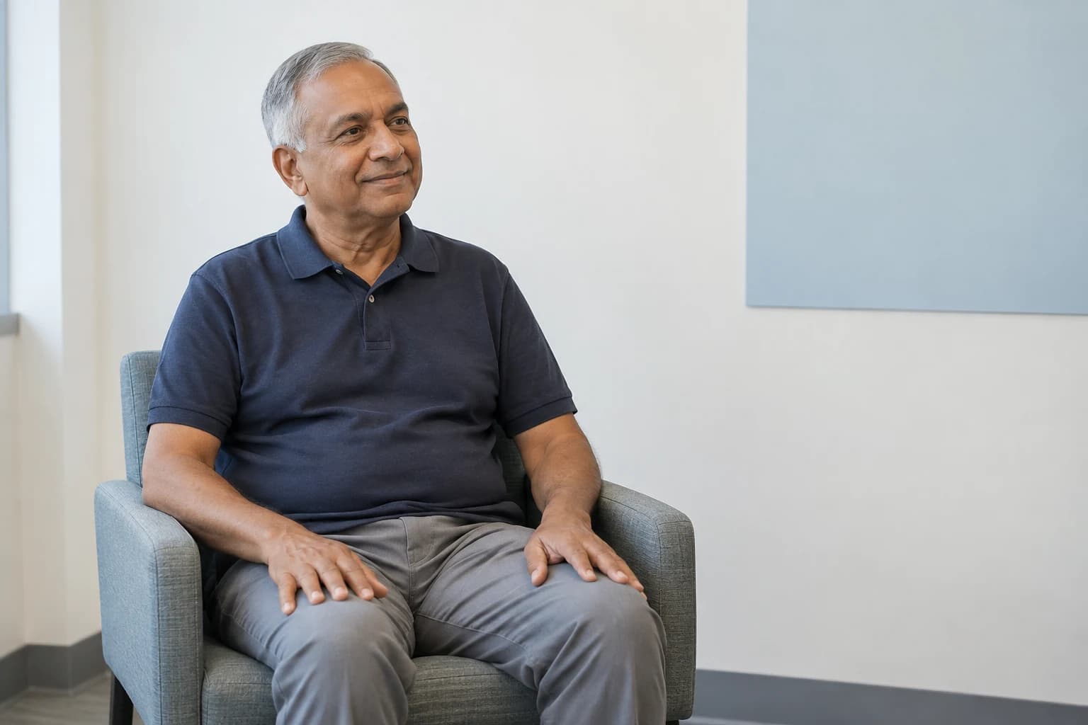 Illustrative outpatient seated in a consultation room